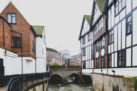 Kingston upon Thames, United Kingdom - April 2018:  Clattern Bridge over the Hogsmill, a tributary of the River Thames, in the city of Kingston upon Thames, Englandのeditorial素材