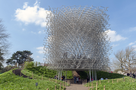 London, UK - April 2018: The Hive, a 17 metres tall aluminium construction dotted by 1,000 LED lights designed by artist Wolfgang Buttress to provide visitors sound and visual experience about honeybees located at Kew Gardens, Englandのeditorial素材