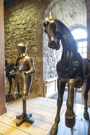 London, UK - April 2018: Collections of the Royal Armouries including historic arms and armours of previous kings of England exhibited inside the White Tower building at the Tower of London, royal palace and castle by the River Thames in London, Englandのeditorial素材