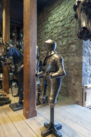 London, UK - April 2018: Collections of the Royal Armouries including historic arms and armours of previous kings of England exhibited inside the White Tower building at the Tower of London, royal palace and castle by the River Thames in London, Englandのeditorial素材