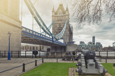 London, UK - April 2018: Tower Bridge, a combined bascule and suspension bridge with twin towers crossing the River Thames which becomes an iconic landmark and major tourist attraction of London, Englandのeditorial素材