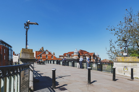 Berkshire, UK - April 2018: The Windsor Bridge or Windsor Town Bridge, an iron and granite arch...