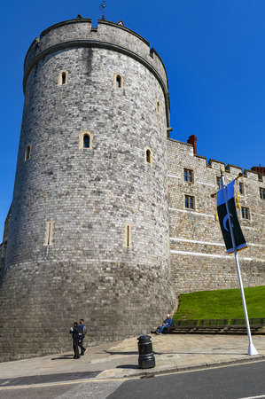 Windsor, UK - April 2018: Curfew Tower, the belfry of the College of St George at Windsor Castle, royal residence at Windsor in county of Berkshire, England, UKのeditorial素材