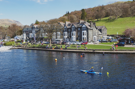 South Lakeland, UK - April 2018: Ambleside, a small lakeside town situated at the head of Windermere Lake within the Lake District National Park in Englandのeditorial素材