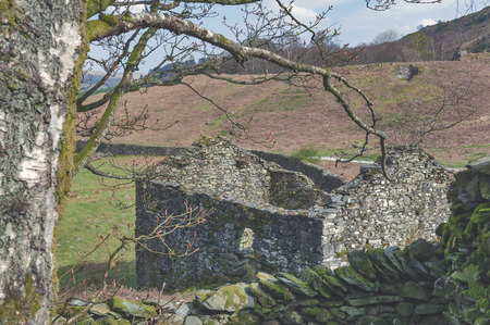Countryside landscape at a sheep farm in Lake District of England, United Kingdomの写真素材