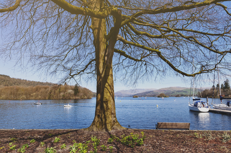 South Lakeland, UK - April 2018: Beautiful Bowness Bay seen from the bank of Windermere at Bowness-on-Windermere, a small tourist resort town in Lake District, Englandのeditorial素材