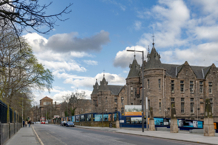 Edinburgh, Scotland - April 2018: Historic Scottish Baronial style buildings of the former Royal Infirmary of Edinburgh that was used as Old Surgical Hospital, now being restored by Quartermile Development for University of Edinburgh, Scotland, UKのeditorial素材