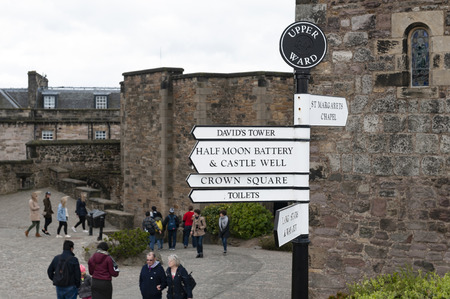 Edinburgh, Scotland - April 2018: Direction signpost inside Edinburgh Castle, popular tourist attraction and landmark of Edinburgh, capital city of Scotland, UKのeditorial素材