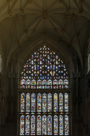 York, England - April 2018: The Great East Window, largest expanse of medieval stained glass in United Kingdom at the East End of York Minster, historic cathedral built in English gothic architectural style and major tourist landmark of the City of York iのeditorial素材