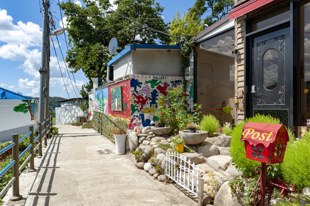 Jeonju, South Korea - September 2018: Colourful paintings and decorations on walls and buildings at Jaman Mural Village, popular tourist attraction, located near Jeonju Hanok Village in Jeonju, South Koreaのeditorial素材