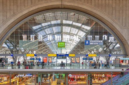 Leipzig, Germany - October 2018: Interior of Leipzig Hauptbahnhof, central railway terminal station in downtown Leipzig city and Promenaden Hauptbahnhof, large shopping mall operated by Deutsche Bahn AG, a German railway companyのeditorial素材