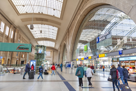 Leipzig, Germany - October 2018: Interior of Leipzig Hauptbahnhof, central railway terminal station in downtown Leipzig city and Promenaden Hauptbahnhof, large shopping mall operated by Deutsche Bahn AG, a German railway companyのeditorial素材