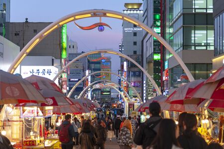 Busan, South Korea - April 2019: Busan International Film Festival (BIFF) Square, famous movie district and cultural tourist attraction with street food stalls and shops along the way in Nampodong, Busan City, South Koreaのeditorial素材