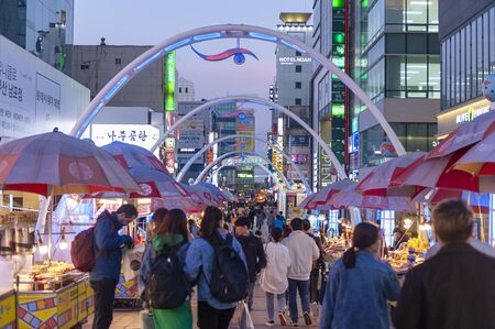 Busan, South Korea - April 2019: Busan International Film Festival (BIFF) Square, famous movie district and cultural tourist attraction with street food stalls and shops along the way in Nampodong, Busan City, South Koreaのeditorial素材