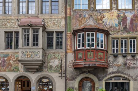 Stein Am Rhein, Switzerland - October 2019: Historic medieval building with unique bay windows decorated by fresco paintings at Rathausplatz, a town square in old small city of Stein Am Rhein, Switzerland.のeditorial素材