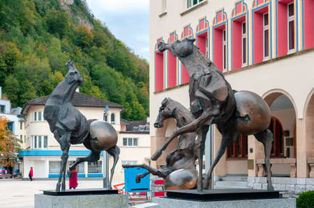Vaduz, Liechtenstein - October 2019: Bronze sculptures named âTre Cavalliâ (The Three Horses) by Swiss artist, Nag Arnoldi, installed at Vaduz town hallのeditorial素材