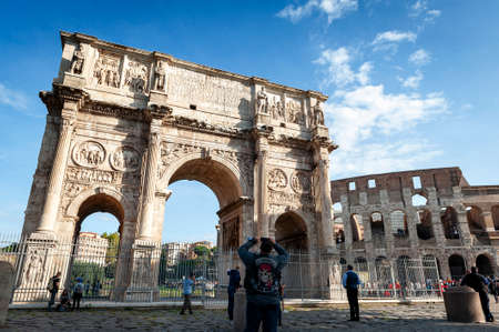 Rome, Italy - October 2019: The Arch of Constantine, a triumphal arch in Rome, situated between the Colosseum and the Palatine Hill in Colosseum archaeological park in Rome, Italyのeditorial素材