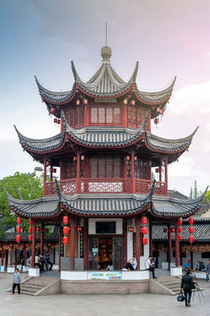 Shanghai, China - September 2019: The Bell Tower built in traditional Chinese architecture style located at the entrance to Qibao Old Street in Qibao Ancient Town, a historic water township of Qibao in the Minhang District of Shanghai, Chinaのeditorial素材