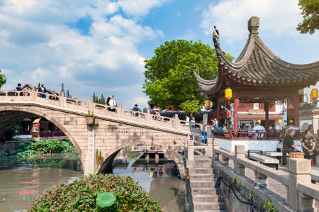 Shanghai, China - September 2019: Old bridges over the Puhui River in Qibao Ancient Town, a historic water township of Qibao in the Minhang District of Shanghai, Chinaのeditorial素材