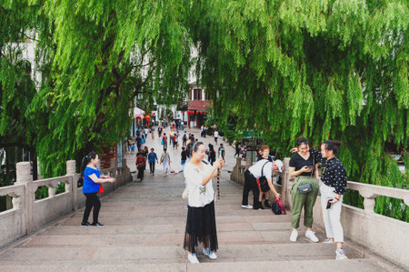 Shanghai, China - September 2019: Old bridges over the Puhui River in Qibao Ancient Town, a historic water township of Qibao in the Minhang District of Shanghai, Chinaのeditorial素材