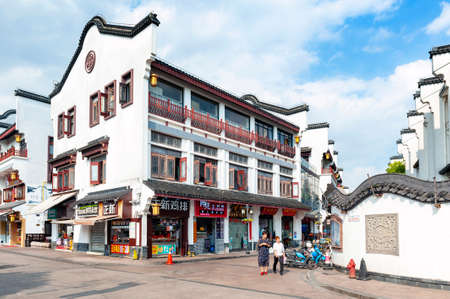 Shanghai, China - September 2019: Buildings and shophouses built in traditional Chinese architecture style located in Qibao Ancient Town, a historic water township of Qibao in the Minhang District of Shanghai, Chinaのeditorial素材