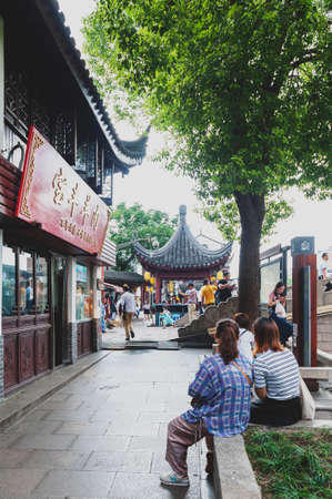 Shanghai, China - September 2019: Buildings and shophouses built in traditional Chinese architecture style located in Qibao Ancient Town, a historic water township of Qibao in the Minhang District of Shanghai, Chinaのeditorial素材