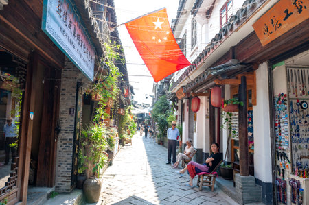 Shanghai, China - September 2019: Old residential buildings transformed into shops and restaurants along the alleys in Zhujiajiao Ancient Water Town, a historic village and famous tourist destination in Qingpu District of Shanghai, Chinaのeditorial素材
