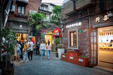 Shanghai, China - September 2019: Tianzifang, a popular tourist destination home to boutique shops, craft stores, trendy art studios, cafes, bars and restaurants along narrow alleys in Shanghai, Chinaのeditorial素材