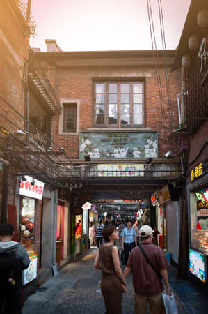 Shanghai, China - September 2019: Tianzifang, a popular tourist destination home to boutique shops, craft stores, trendy art studios, cafes, bars and restaurants along narrow alleys in Shanghai, Chinaのeditorial素材