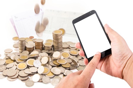 Man hand hold blank touch screen smart phone on finance concept background.