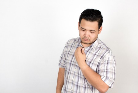 Emotion of Asian fat man on white backgroundの写真素材