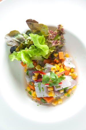 Seabass fillets with cornの写真素材