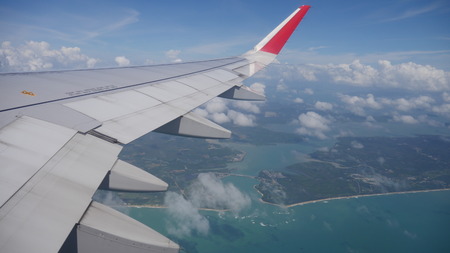 View of clouds from a airplane window. blue backgroundのeditorial素材