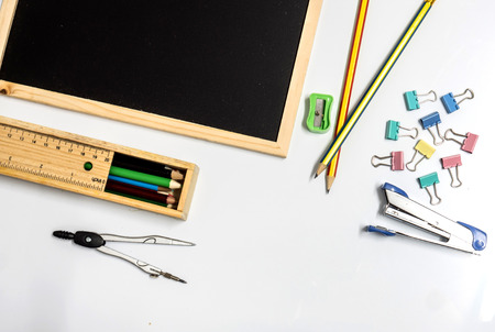 school supplies with pencils, paint pens