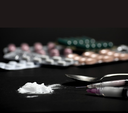 Syringes, drugs, heroin, and cooked.