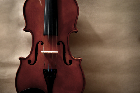 Violin on old paper backgroundの写真素材