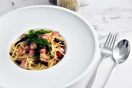 spaghetti Stir-fried Spicy Thai Style Pad Kee Mao on White Dishの写真素材