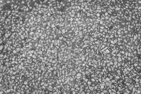 Patterned surface with a coarse stone and gravelの写真素材