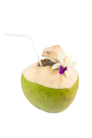 Coconut drink with a straws on white backgroundの写真素材