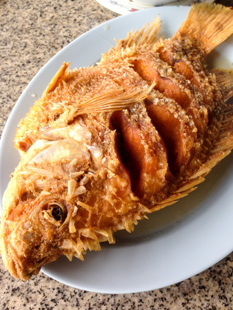 fried fish on a plate Thai local foodの写真素材