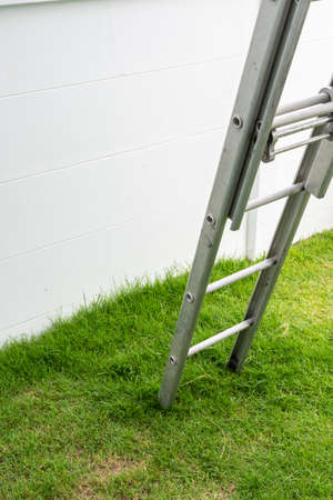 A steel staircase set on the lawn