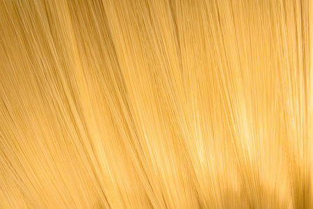 Gold light shiny lines reflecting texture design wallpaper background.の写真素材