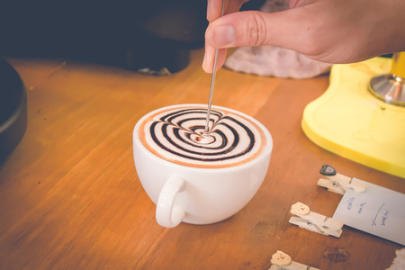 Barista Cafe Making Coffee Preparation Service Concept. vintage effect.の写真素材
