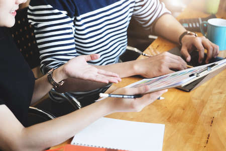 Discussion and exchange of opinions in choosing the color used in the design of the work pieceの写真素材