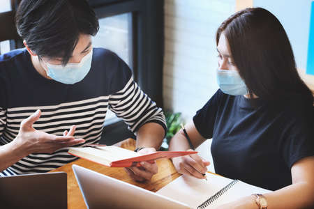 vintage tone effect with focus at businessman Discussion and exchange of ideas during work with...