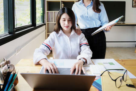 A female business consultant describes a marketing plan to set business strategies for women...