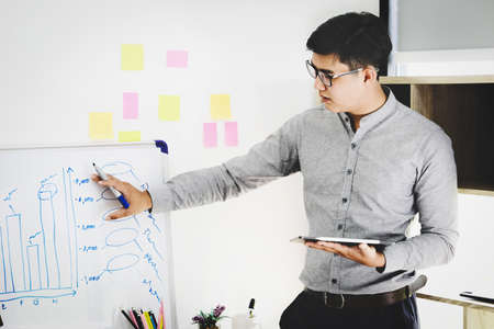 Marketing professionals are offering employees a solution to financial problems in order to apply their knowledge to the companys marketing problems.の写真素材