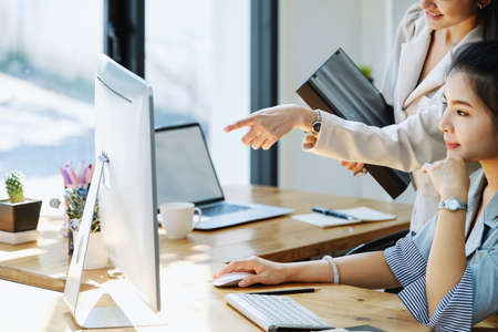 Consultation, discussion, marketing and investment concept, female employee holding folder and...