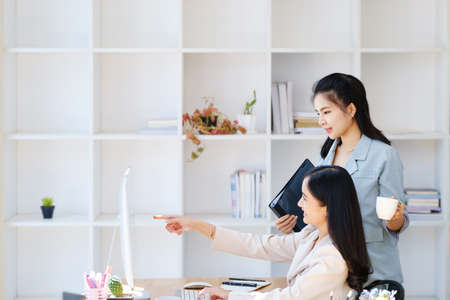 Consultation, discussion, marketing and investment concept, female employee holding folder and...