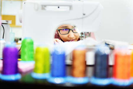 Embroidery, handicrafts, hobbies, SME business, family business, Portrait of Asian female designers...